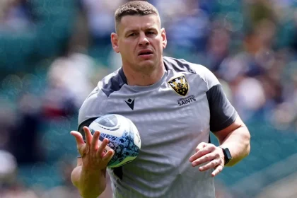 Lee Radford, a former rugby league player, was named Scotland's defense coach.